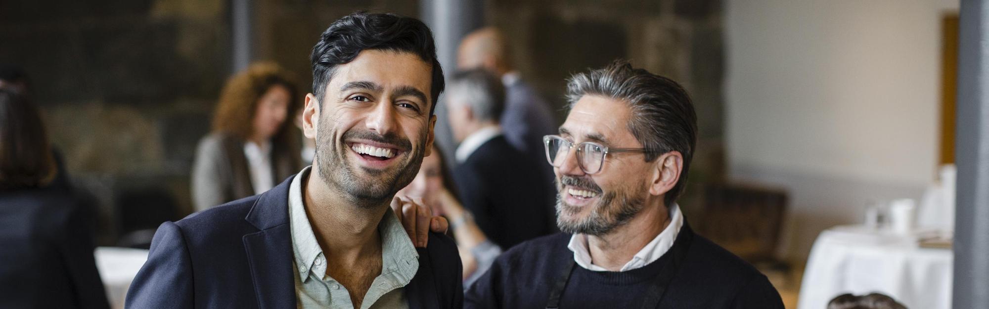 Two men at a business conference